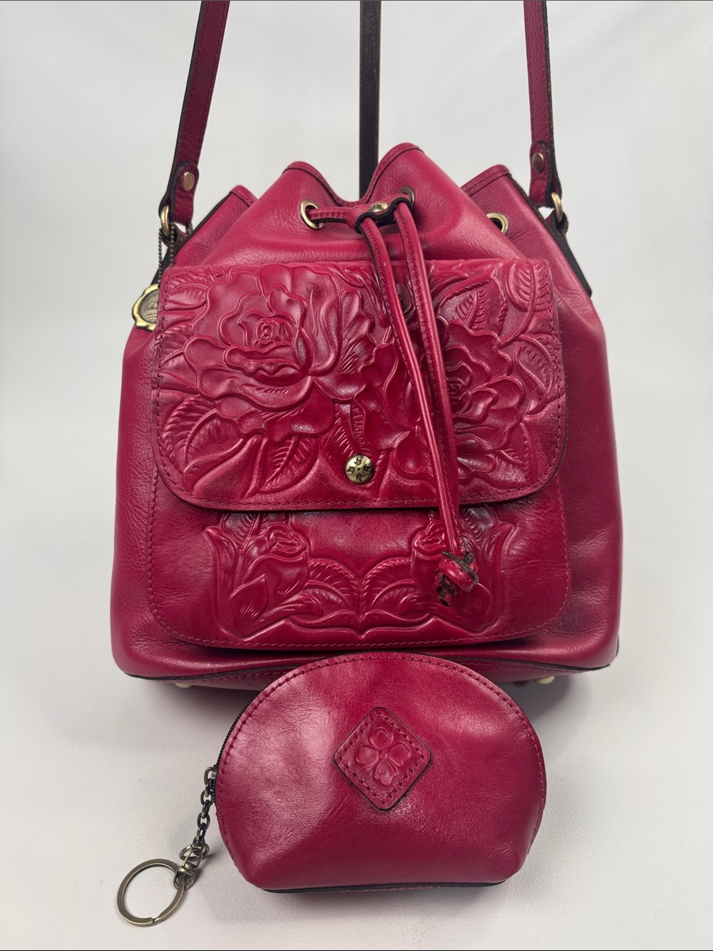 Patricia Nash Embossed Floral Drawstring Bucket Bag in Raspberry Red key pouch